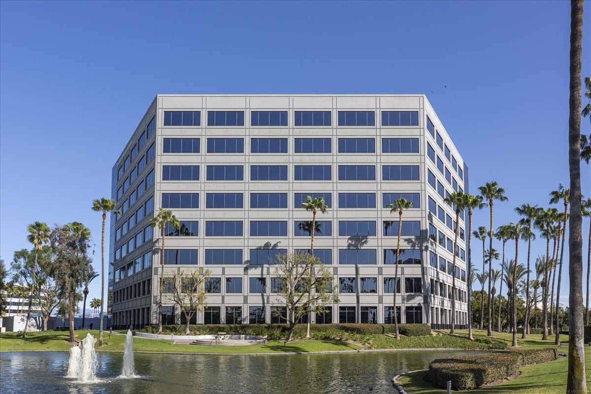 Exterior view of the glass-windowed building at 3281 E. Guasti Road, 7th Floor.