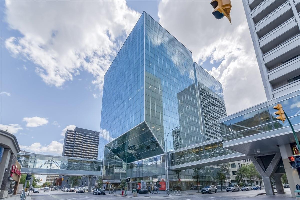 Exterior view of the modern glass-facade building at 330 St. Mary Avenue, Suite 300.
