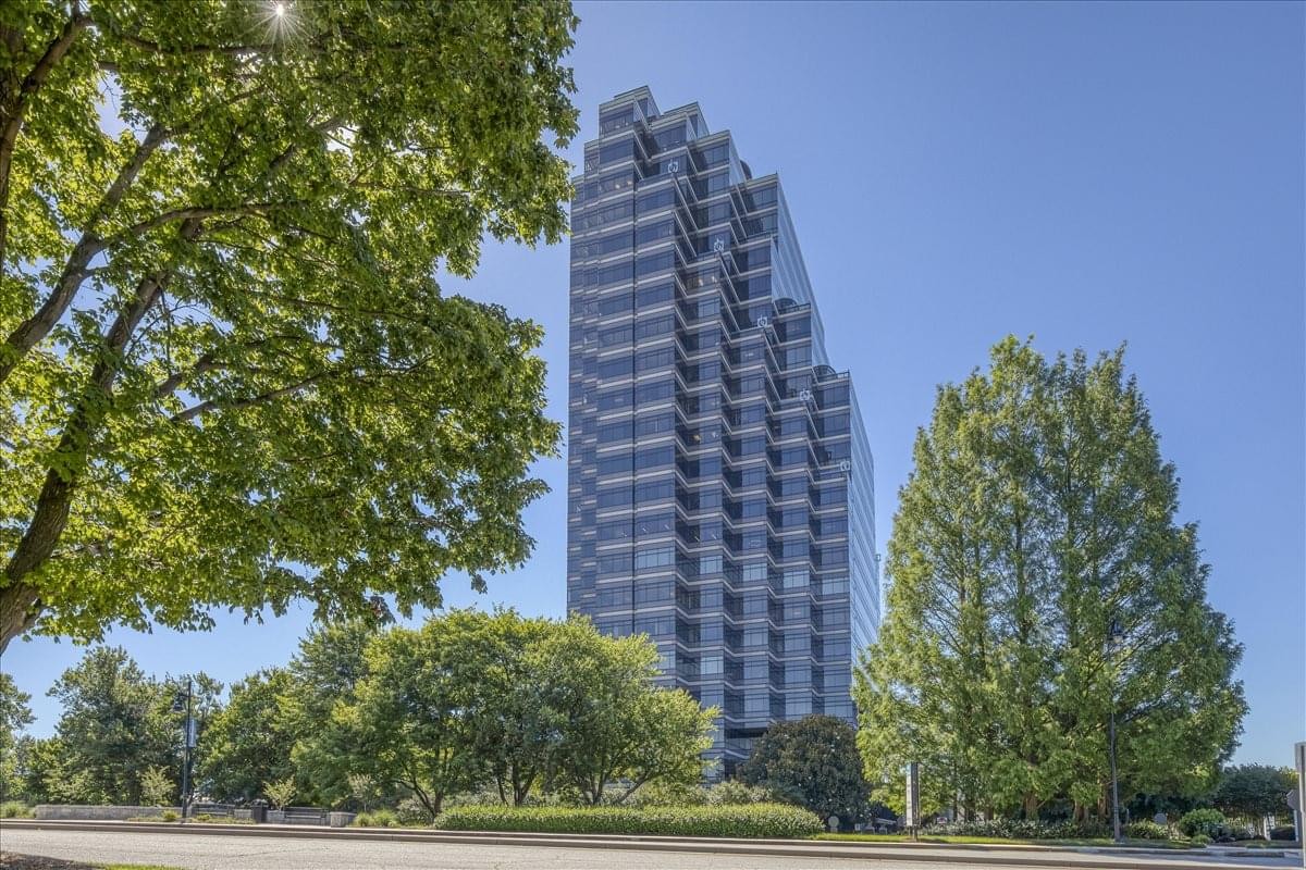Exterior view of the glass-facade Riverwood Center at 3350 Riverwood Parkway.
