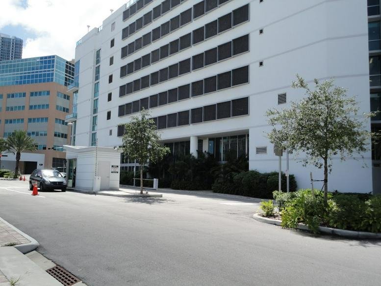 Exterior view of the white multi-story office building at 350 S Miami Avenue, Brickell, Downtown Miami.