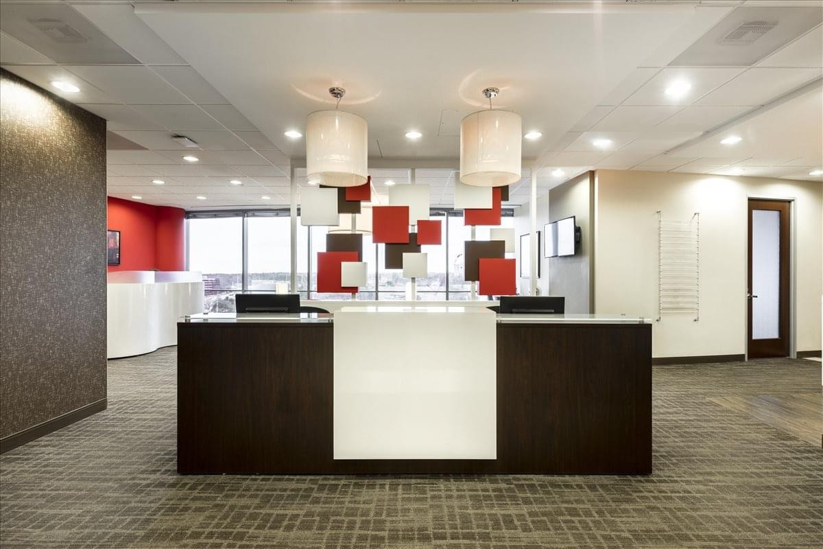 Sleek professional reception desk at the 3500 Lenox Rd center.