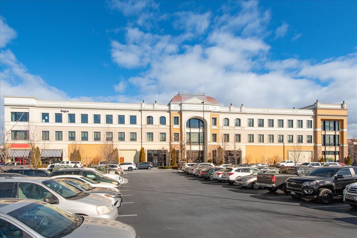 Exterior view of the multi-story office building at 3597 E. Monarch Sky Lane.