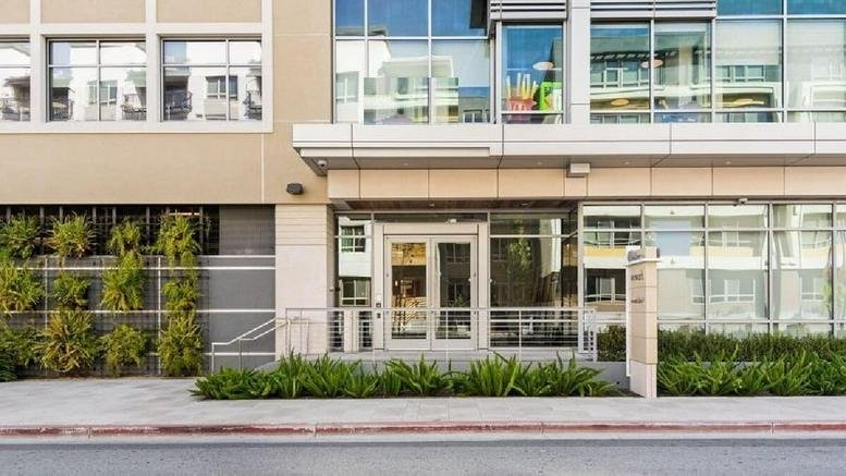 Exterior entrance of the modern office building at 400 Concar Drive.