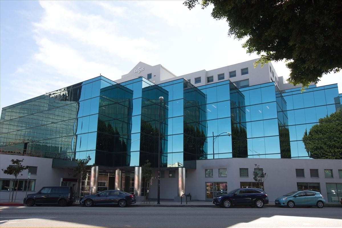 Modern glass exterior of the 4100 W. Alameda Avenue 3rd Floor building.
