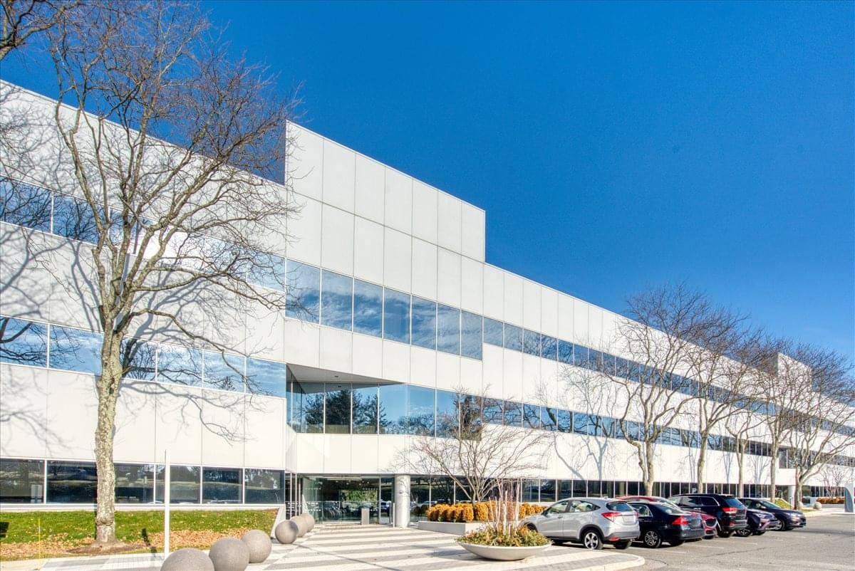 Exterior view of the modern white office building at 411 Theodore Fremd Ave. , Rye Center.