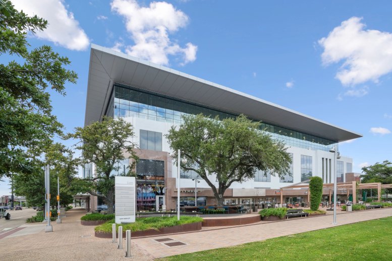 Exterior view of the modern, glass-facade building of The Ion at 4201 Main Street.