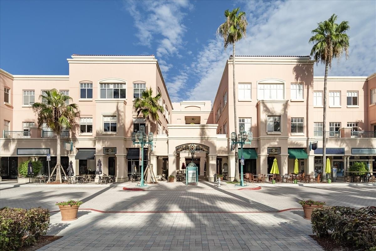 Exterior view of the Mediterranean-style buildings at 433 Plaza Real, Mizner Park.