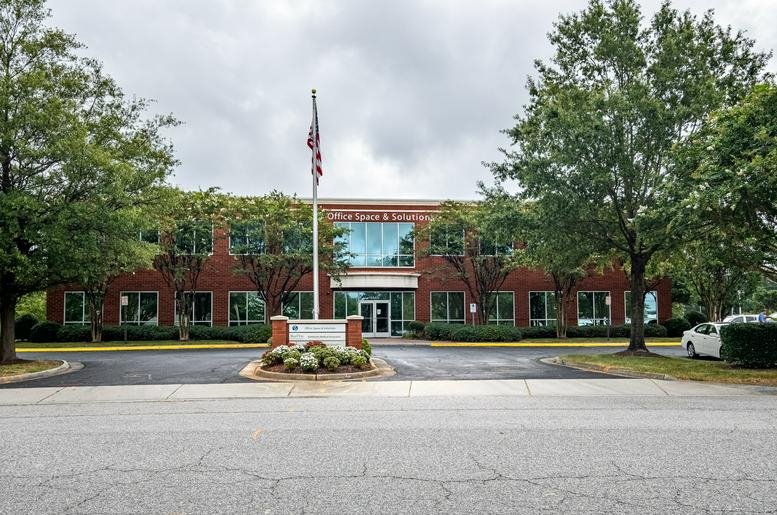 Exterior view of the brick facade at Office Space & Solutions, Town Center, Virginia Beach.
