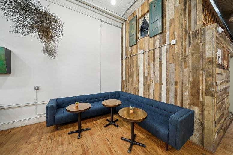 Wide-angle view of the 447 Broadway, 2nd Floor office showing desks and lounge areas.