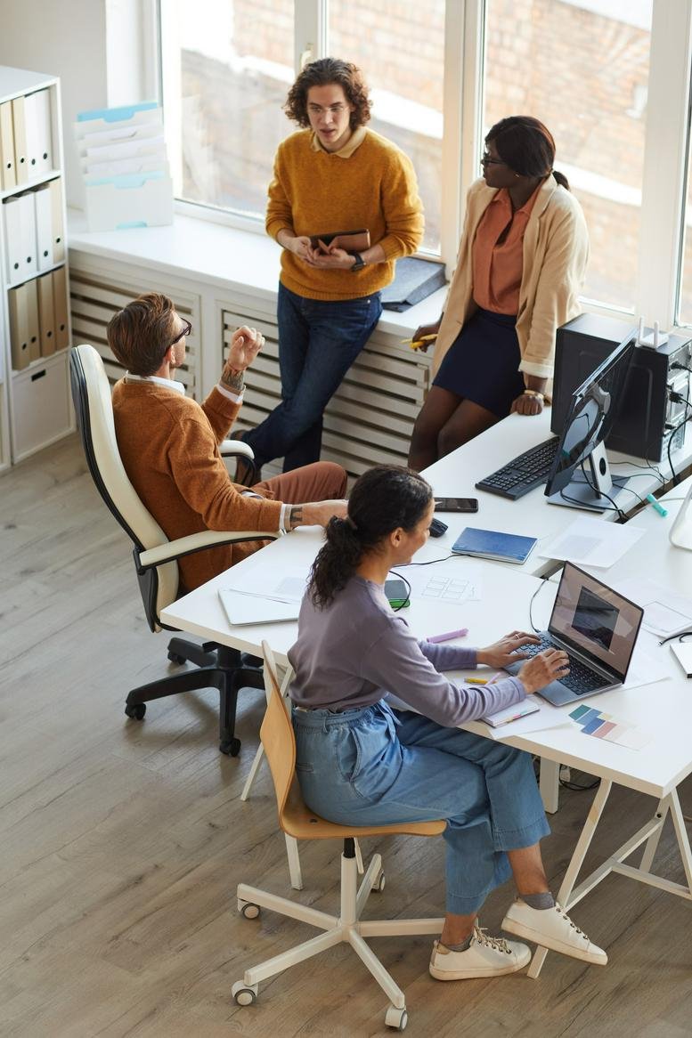 A vibrant open-plan workspace at 450 Lexington Avenue, 4th Floor, Grand Central where a team collaborates.