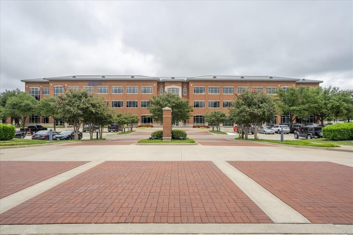 Exterior view of the brick-facade building at 4500 Mercantile Plaza.