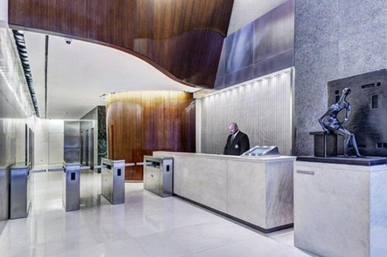 The elegant marble and wood-paneled entrance lobby at 485 Madison Avenue, New York, New York State, USA.
