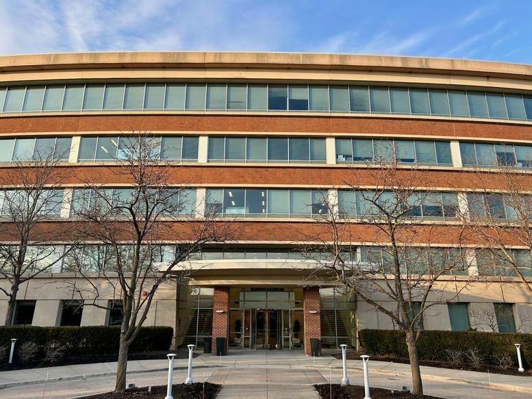 Exterior view of the multi-story brick and glass facade at 25N, West Half Day Road, Buffalo Grove.