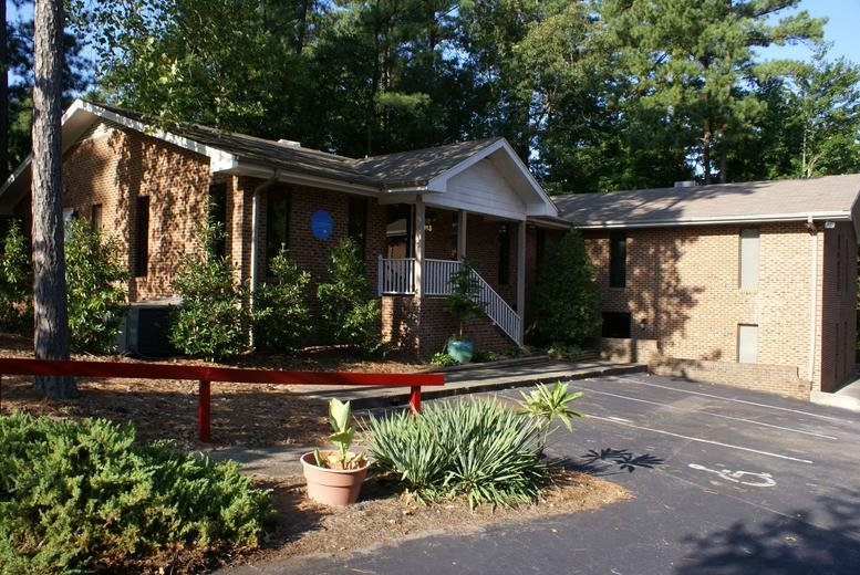 Exterior of the brick and stone building for Office Ours, 4913 Professional Court.