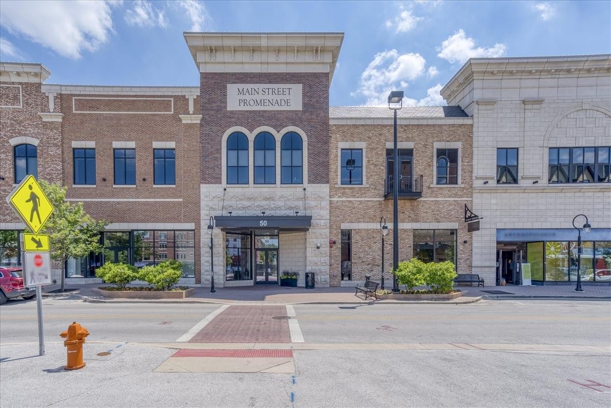 Exterior facade of the brick and stone Main Street Promenade Centre.