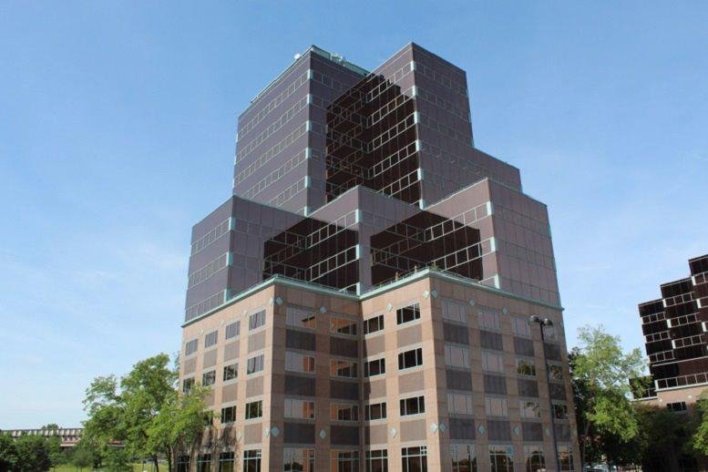 Exterior view of the Crown Centre building with a unique zigzag facade design.