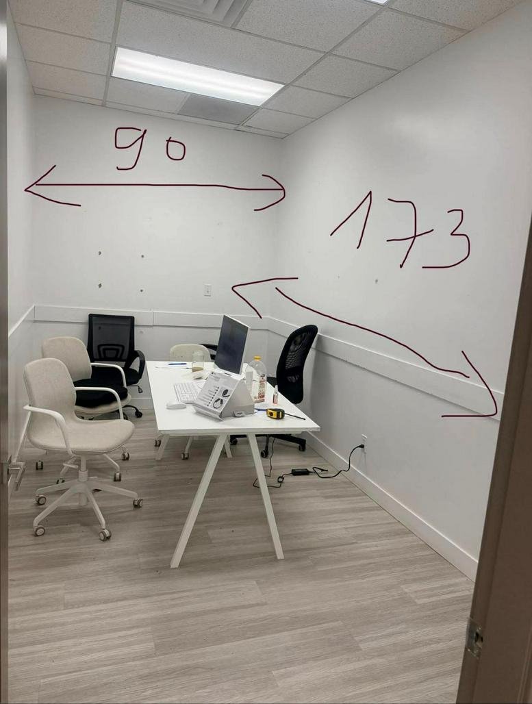 Private office at 5021 Kingsway, Unit 114, featuring a white desk, chairs, and light wood flooring.
