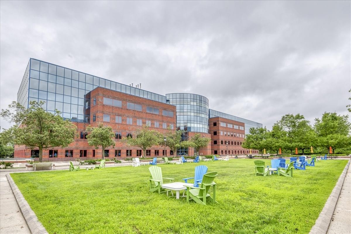 Exterior view of the brick and glass facade at 51 JFK Parkway, Short Hills Center.