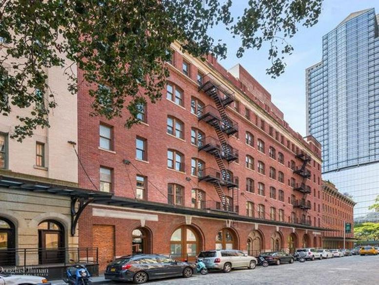 Red brick facade of the industrial-style building at 53 Beach Street, New York City.