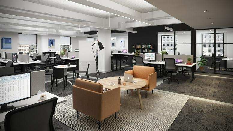 Spacious open-plan office at 530 Fifth Avenue, New York City with tan armchairs and bright workstations.