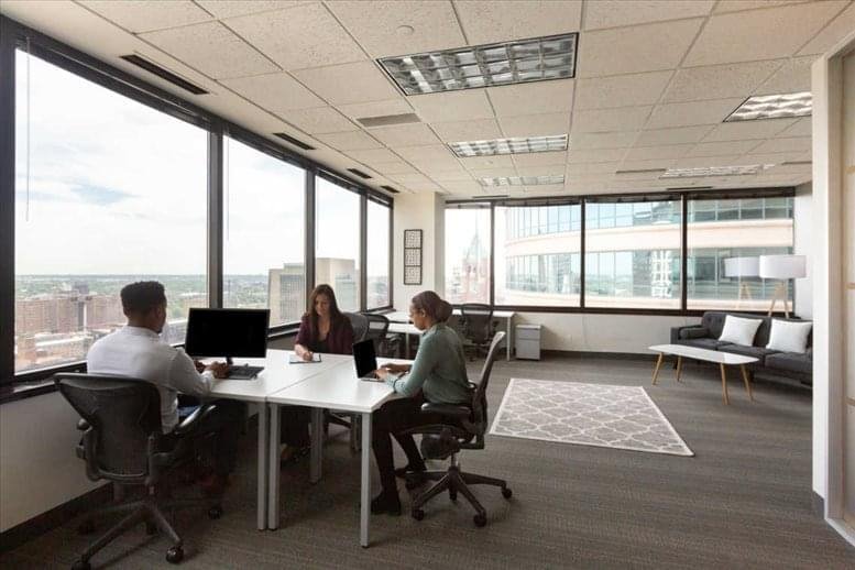 Bright open-plan office at 530 Technology Drive, Suite 100 & 200 with panoramic window views.