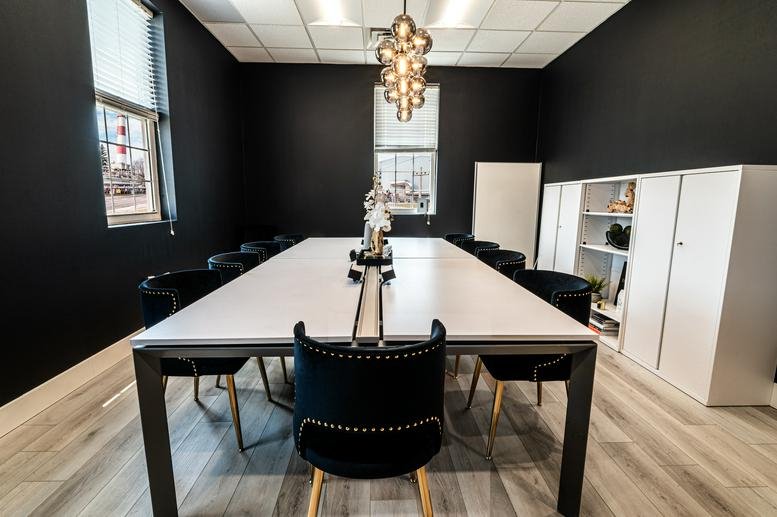 Formal conference room at Brick House Co-Working, Unit 1, 5386 Majestic Parkway.