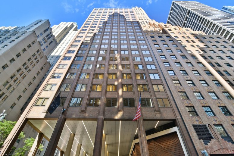 Worm's-eye view of the 560 Lexington Avenue skyscraper with its distinctive tiered brick facade.