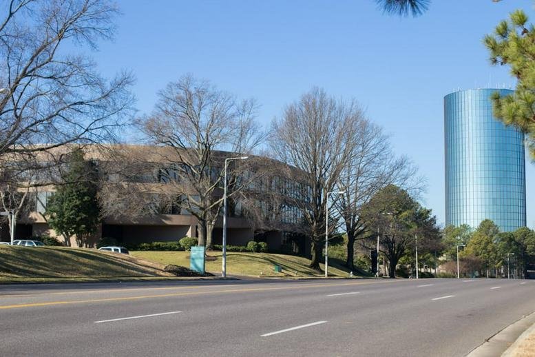 Exterior view of the low-rise office building at 5865 Ridgeway Center Parkway.
