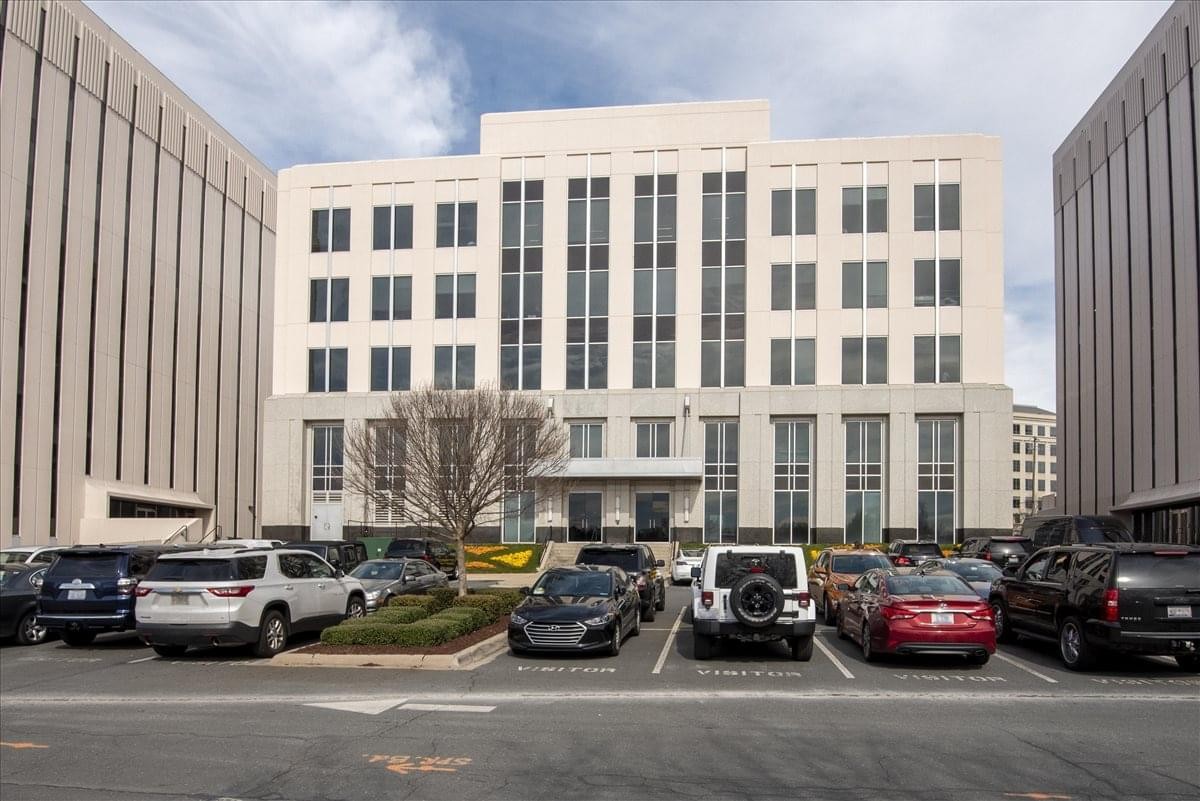 Exterior view of the multi-story professional building at 5960 Fairview Road, Suite 400.