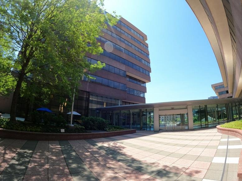 Exterior view of the brick facade and glass entrance at 6 Landmark Square.