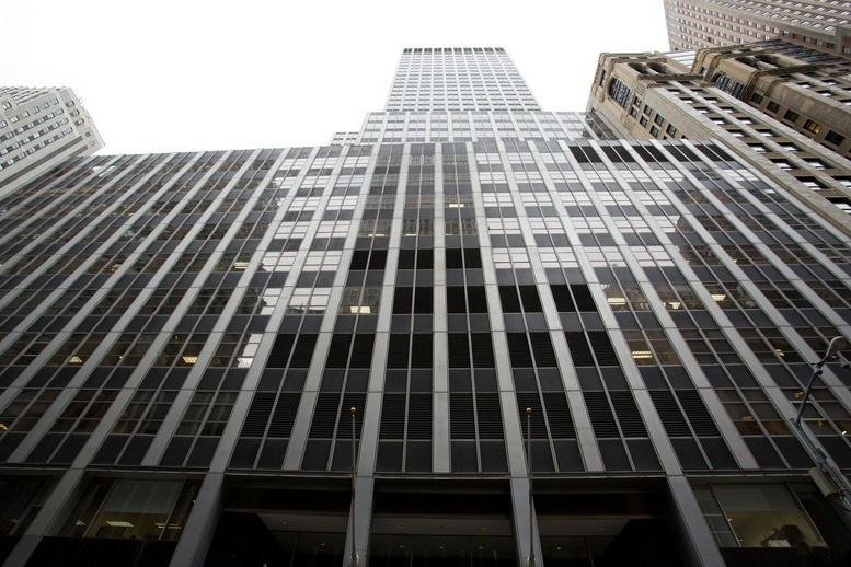 Exterior view of the towering glass and steel facade at 60 Broad Street.