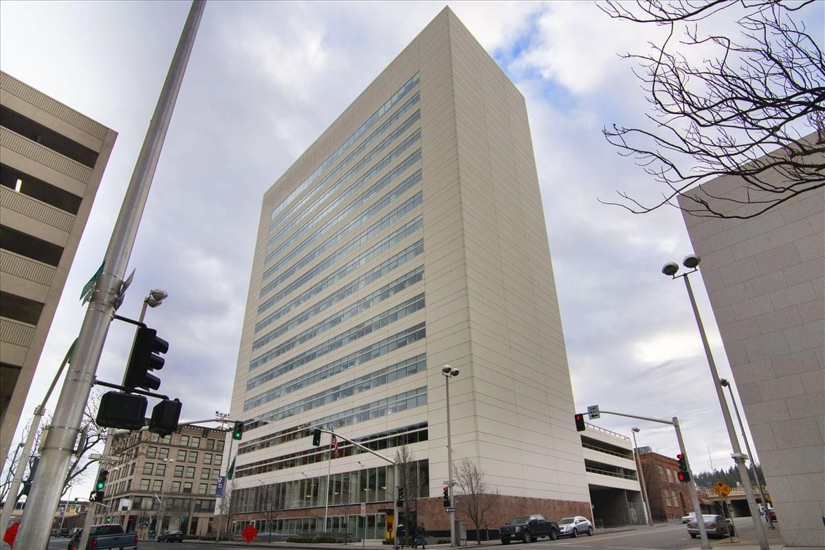 Exterior view of the towering white facade of The Wells Fargo Center.