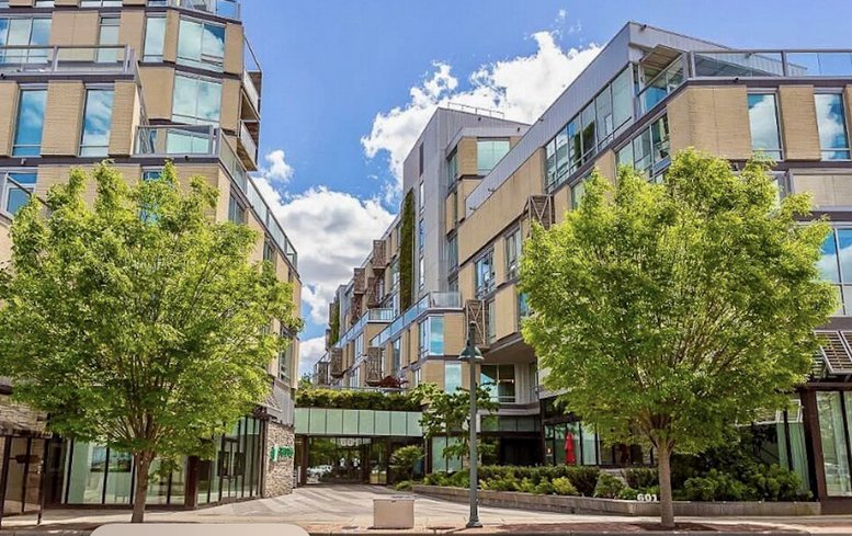 Exterior view of the modern, mixed-use buildings at 601 West Rosemary Street.