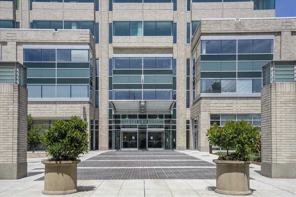 Exterior entrance view of the stone and glass building at 650 N. E. Holladay Street.