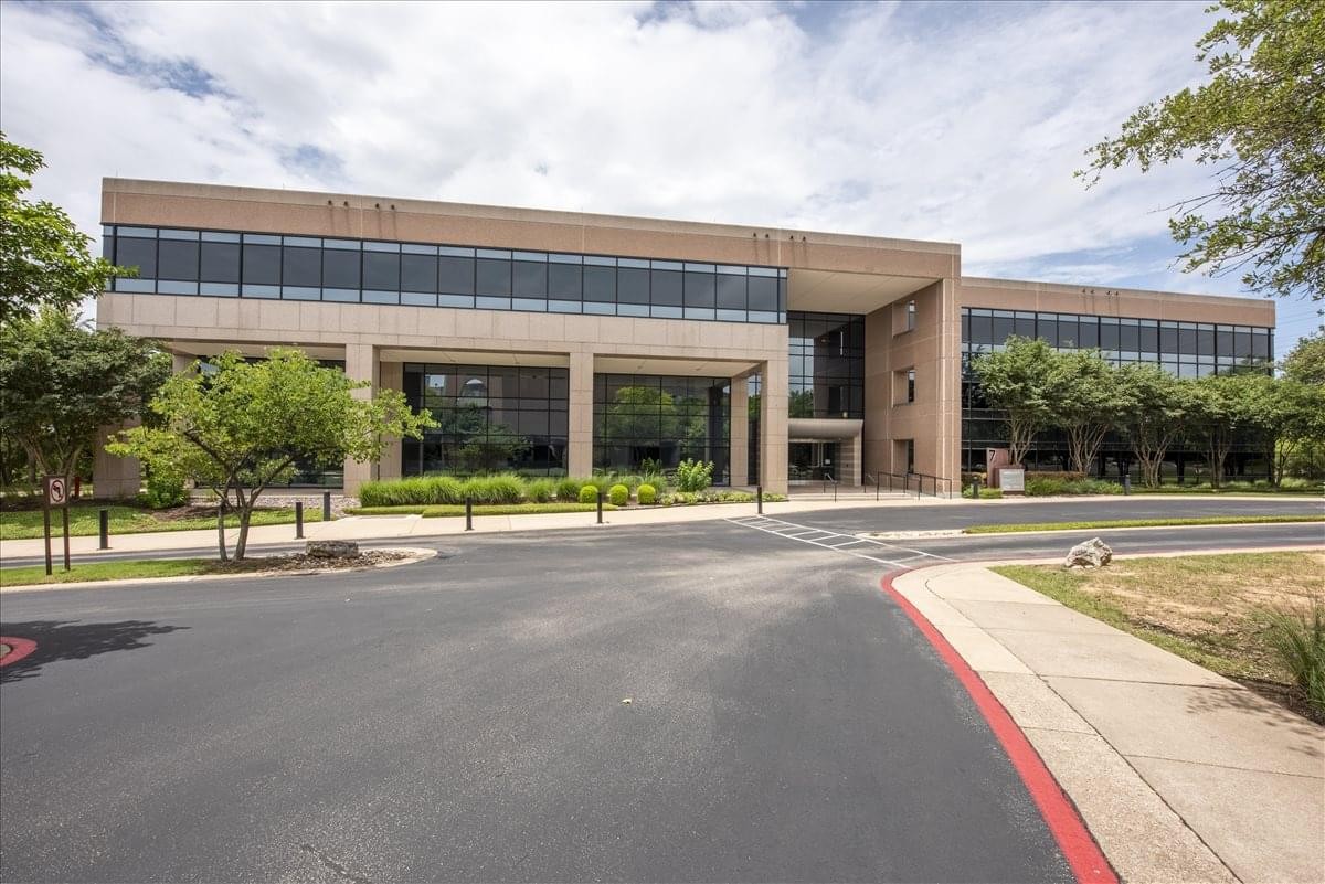 Exterior view of the low-rise office building at 6500 River Place Blvd, Building VII, Suite 250.