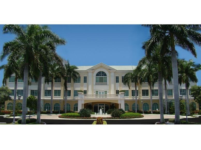 Exterior view of the stately multi-story building at 6501 Congress Avenue, Suite 100.