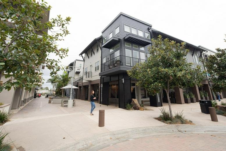 Exterior view of the modern, mixed-use office building at 6790 Embarcadero Lane.