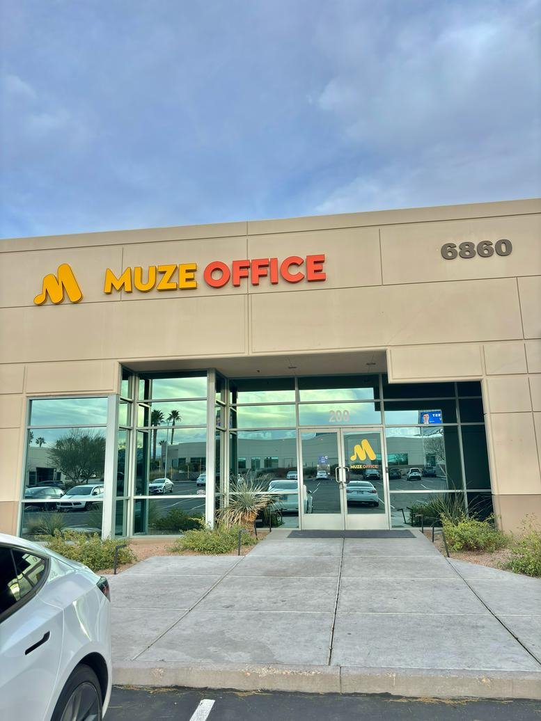 Exterior entrance and facade of Muze Office at 6860 Bermuda Rd.