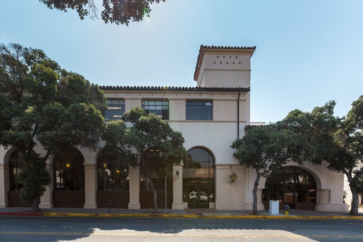 Exterior view of the Mediterranean-style building at 7 West Figueroa Street, Suites 200 & 300.