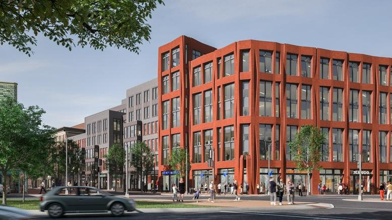 Wide-angle exterior view of the red brick facade at 700 Pennsylvania Ave SE.