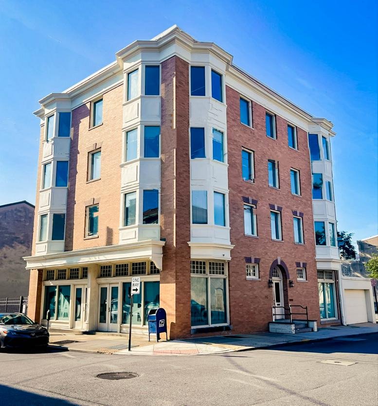 Exterior view of the brick building at 8th & Tatnall, 716 North Tatnall Street.