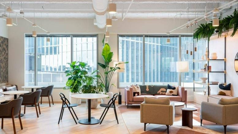 The stylish lobby and communal lounge at 717 Texas Avenue, Theater District, Houston.