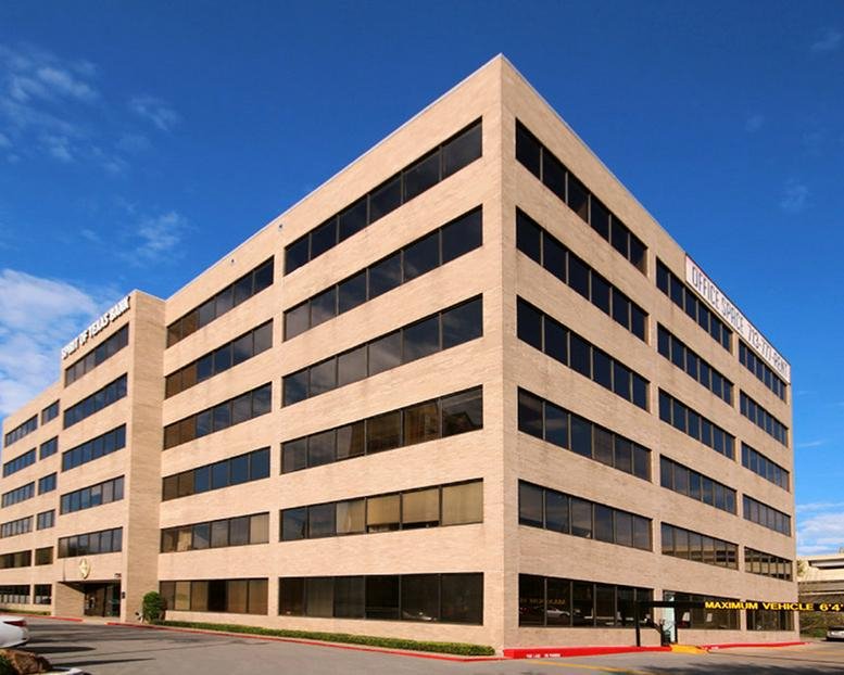 Exterior view of the multi-story professional office building at 720 North Post Oak Road.