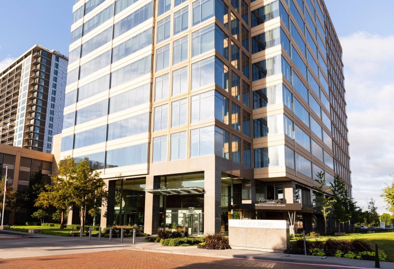 Exterior view of the glass-facade Legacy Tower building at 7250 Dallas Parkway.