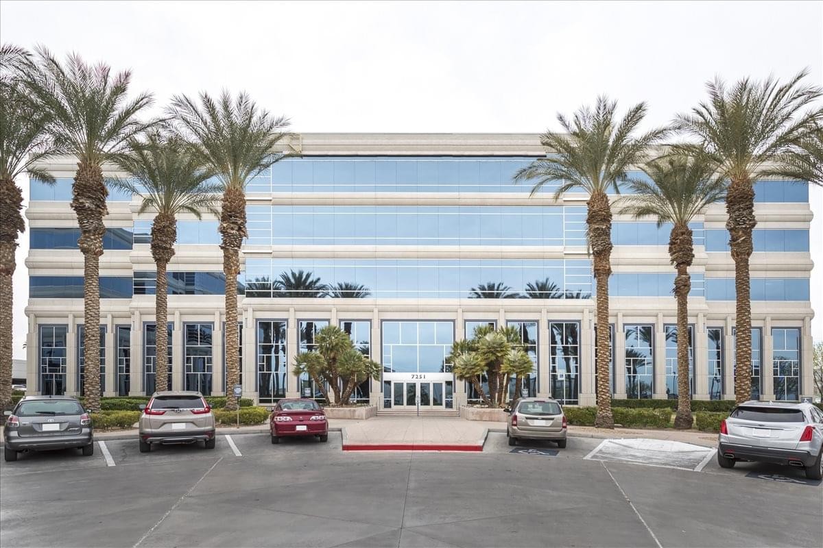Exterior view of the glass-facade 7251 West Lake Mead Boulevard, Suite 300, Summerlin Center building.