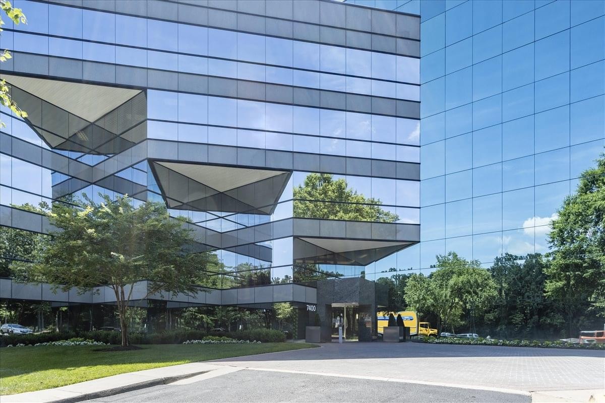 Exterior view of the glass-facade 7400 Beaufont Springs Drive, Suite 300.