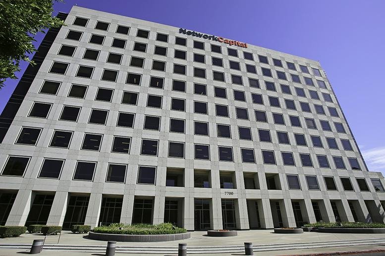 Exterior view of the multi-story office building at 7700 Irvine Center Drive.