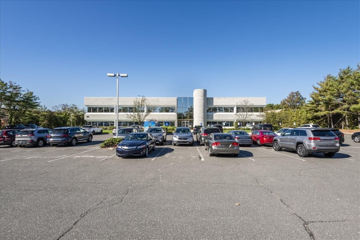 Exterior view of the landscaped office park at 80 Orville Drive, Bohemia/Islip Airport Center.