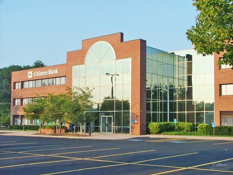 Exterior view of the brick and glass facade at 835 Hanover Street, Suite 201.