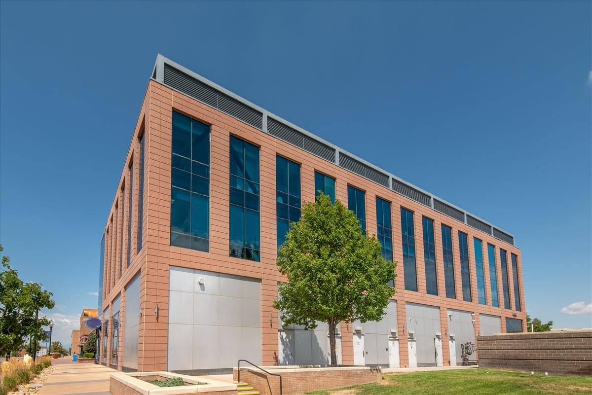 Exterior view of the brick and glass building at 8354 Northfield Blvd. Building G.